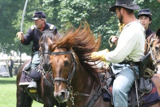 Major Milburn and Cpl Kane engage